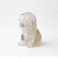 Pug dog statue crafted from light purple and green resin with natural crystal stones - Colorful Fluorite