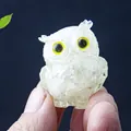 Miniature owl figurine in translucent white resin with striking yellow eyes - White Crystal