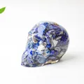 Deep blue Lapis Lazuli crystal skull resin figurine with natural stone textures - Lapis Lazuli
