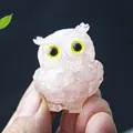 Pink resin owl figurine with yellow eyes handcrafted from natural crystal stones - Rose Quartz