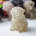 Hand-carved pug statue in translucent yellow citrine crystal with detailed facial folds - White Crystal