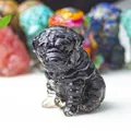 Detailed black resin pug figurine with realistic wrinkled texture for home office desk - Obsidian