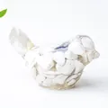 Bird figurine crafted with clear resin and white natural crystal stones for desk decor - Howlite