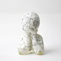 Humanoid statue crafted from white natural crystal stone chips and transparent resin - Howlite