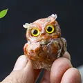 Resin owl figurine with red natural crystal stone inlay and striking yellow eyes - Red Agate
