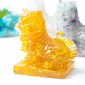 Handcrafted yellow resin crystal tiger statue with transparent textured finish - Citrine