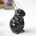 Modern black resin rabbit figurine with gold foil ears and a polished mirror finish - Style ① Obsidian