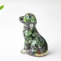 Sitting dog statue made of clear resin with green and purple natural crystal stones - Ruby Zoisite