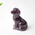 Deep reddish-purple resin puppy statue with natural crystal stones for desk decor - Garnet