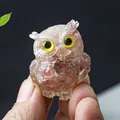 Handcrafted pink crystal owl resin ornament with lifelike yellow eyes for home decor - Strawberry Quartz