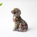 Sitting puppy statue made of clear resin with colorful natural crystal stone filling - Dragon Blood Stone