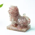 Tiger resin statue with red strawberry crystal stones on a clear square base pedestal - Strawberry Quartz