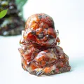 Laughing Buddha statue made of clear resin and red jasper stones for home decor - Red Agate