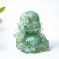 Laughing Buddha statue made of green resin with natural crystal fragments for decor - Green Aventurine