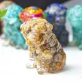Handcrafted resin Shar Pei dog figurine with realistic wrinkled texture in amber - Crazy Agate