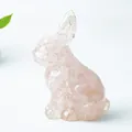 Charming rose quartz rabbit figurine with translucent crystal texture on white background - Rose Quartz