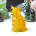 Cat figurine in translucent resin filled with yellow crystals for home decor - Citrine