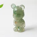 Translucent green natural crystal bear figurine with raw gemstone texture and bow tie - Green Aventurine