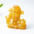 Amber crystal resin God of Wealth figurine with gold ingot for prosperity and luck - Citrine