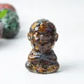 Meditating monk statue crafted from resin and tiger eye crystals for desk decor - Tiger's Eye