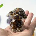 Tiger Eye stone resin teddy dog figurine on fingertips with polished finish - Tiger's Eye