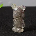 Artistic crystal bear figurine in purple and clear resin stones on black surface - Colorful Fluorite