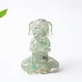 Meditating dog figurine made of clear resin with green natural stones for home zen decor - Green Aventurine