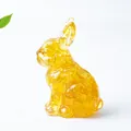 Charming amber resin standing rabbit figurine with natural crystal stone inlay - Citrine