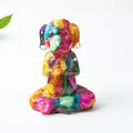 Meditation dog statue featuring colorful natural crystals embedded in clear resin - Colorful Shell
