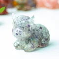 Highland cow figurine crafted with clear resin and purple natural crystal stones - Colorful Fluorite