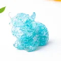 Highland cow figurine in light blue resin with natural crystal stones for desk decor - Aquamarine