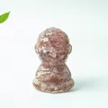 Meditating monk statue crafted from pink strawberry quartz resin for home desk decoration - Strawberry Quartz