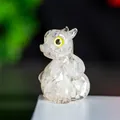 Escultura de dragón en resina transparente con cristal natural y ojos amarillos - Cristal de roca