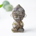 Translucent dark crystal monkey king statue in a peaceful praying meditation pose - Black Labradorite