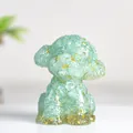 Translucent light green resin puppy figurine with gold flakes in poodle dog shape - Aquamarine