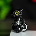 Escultura de dragón en resina negra brillante con ojos amarillos y acabado pulido - Obsidiana