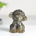 Amber resin teddy dog figurine with gold foil flakes on white marble base - Black Labradorite