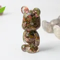 Green epidote crystal bear resin ornament with natural gemstone fragments and glossy finish - Unakite