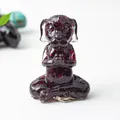Deep red garnet crystal meditating dog figurine for home decor and mindfulness - Garnet