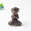 Meditating dog figurine with red and green natural crystal stone in clear resin - Dragon Blood Stone