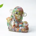 Handcrafted resin bear statue with colorful natural crystal stone fragments - Colorful Cat Eye