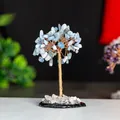 Detailed craftsmanship of blue crystal money tree with copper wire on a sleek base - Blue