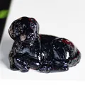 Figurine de chiot Golden Retriever en résine noire polie en position couchée - Obsidienne