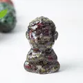 Mini resin monk figurine with red and green natural crystal stone fragments for meditation - Dragon Blood Stone