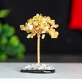 Detailed view of yellow crystal leaves and hand-wrapped copper wire branches on money tree - Yellow
