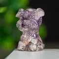 Handcrafted purple amethyst resin schnauzer figurine in a cute sitting dog pose - Dreamy Purple