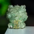 Translucent green resin crystal lion statue with gold Fortune charm for desk decor - Green Aventurine