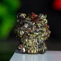 Green and red resin crystal lion figurine with Zhaocai engraving for wealth - Dragon Blood Stone