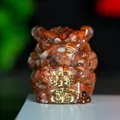 Handcrafted red resin lucky toad statue with wealth symbols and natural crystal details - Red Agate