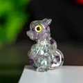 Figura de dragón de cristal de fluorita natural con texturas moradas y verdes - Fluorita de Colores